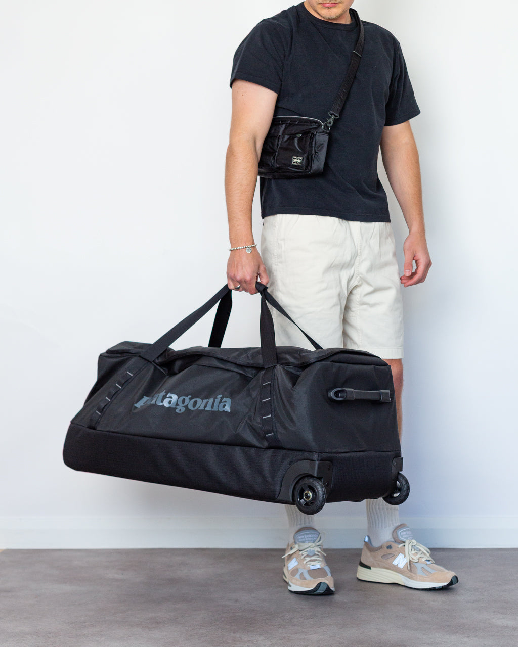 Black Hole Wheeled Duffel 100L - Black | Patagonia | Peggs & son.